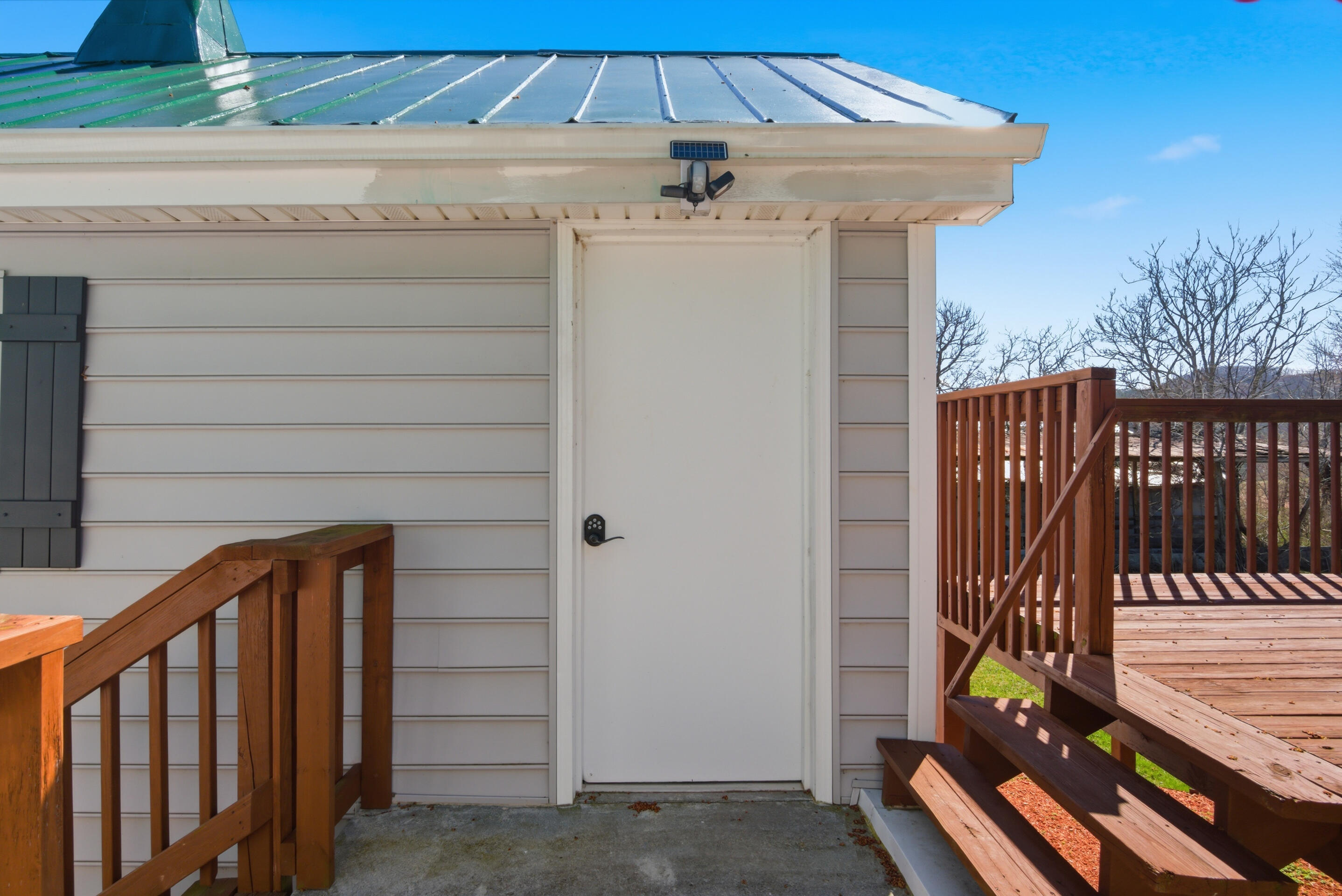 6458 Piney Woods Road Riner, VA 24149 - Photo 42 of 50 a view of a balcony with door