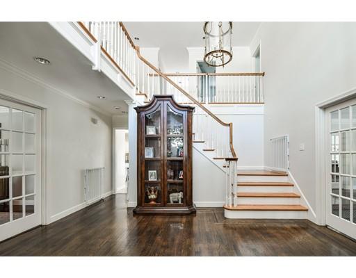 73 Pheasant Landing Road Needham, MA 02492 - Photo 13 of 23 a view of entryway and hall with wooden floor