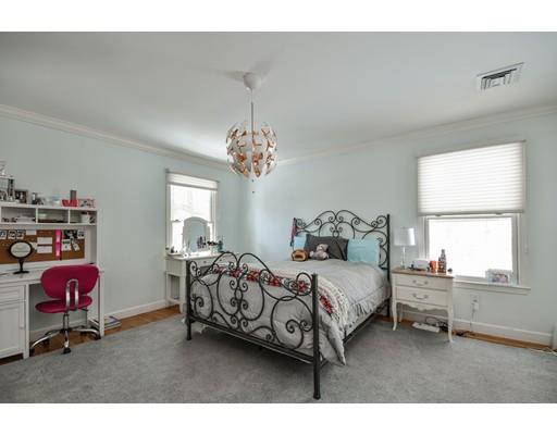 73 Pheasant Landing Road Needham, MA 02492 - Photo 17 of 23 a bedroom with a bed and window