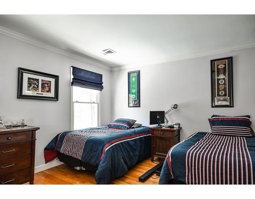 73 Pheasant Landing Road Needham, MA 02492 - Photo 18 of 23 a bedroom with two beds and painting on the wall