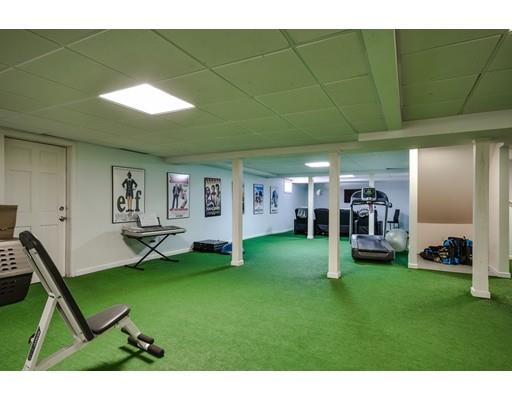 73 Pheasant Landing Road Needham, MA 02492 - Photo 21 of 23 a view of a house with a backyard porch and sitting area