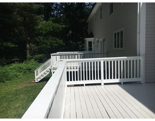 73 Pheasant Landing Road Needham, MA 02492 - Photo 22 of 23 a view of balcony with wooden floor and fence