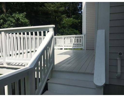 73 Pheasant Landing Road Needham, MA 02492 - Photo 23 of 23 a balcony with wooden floor in outdoor space