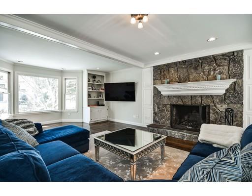 73 Pheasant Landing Road Needham, MA 02492 - Photo 3 of 23 a living room with furniture and a fireplace