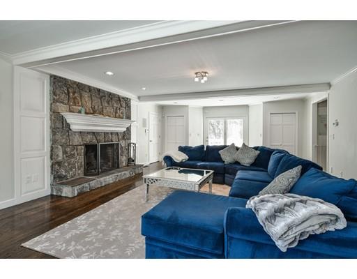 73 Pheasant Landing Road Needham, MA 02492 - Photo 4 of 23 a living room with furniture and a fireplace