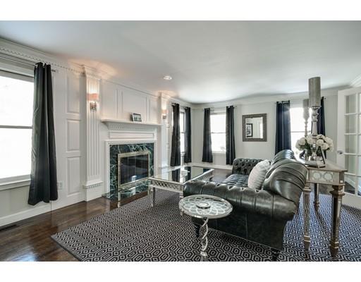 73 Pheasant Landing Road Needham, MA 02492 - Photo 5 of 23 a living room with furniture and a fireplace