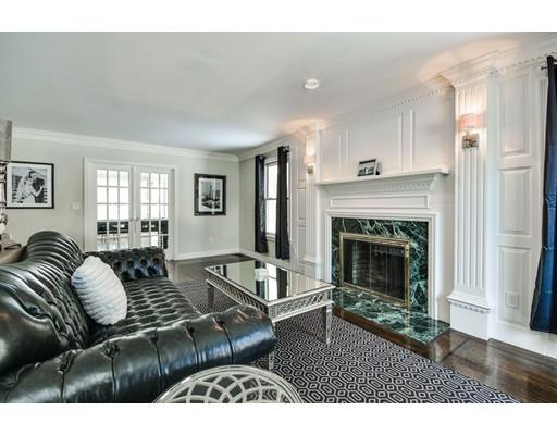 73 Pheasant Landing Road Needham, MA 02492 - Photo 6 of 23 a living room with furniture and a fireplace