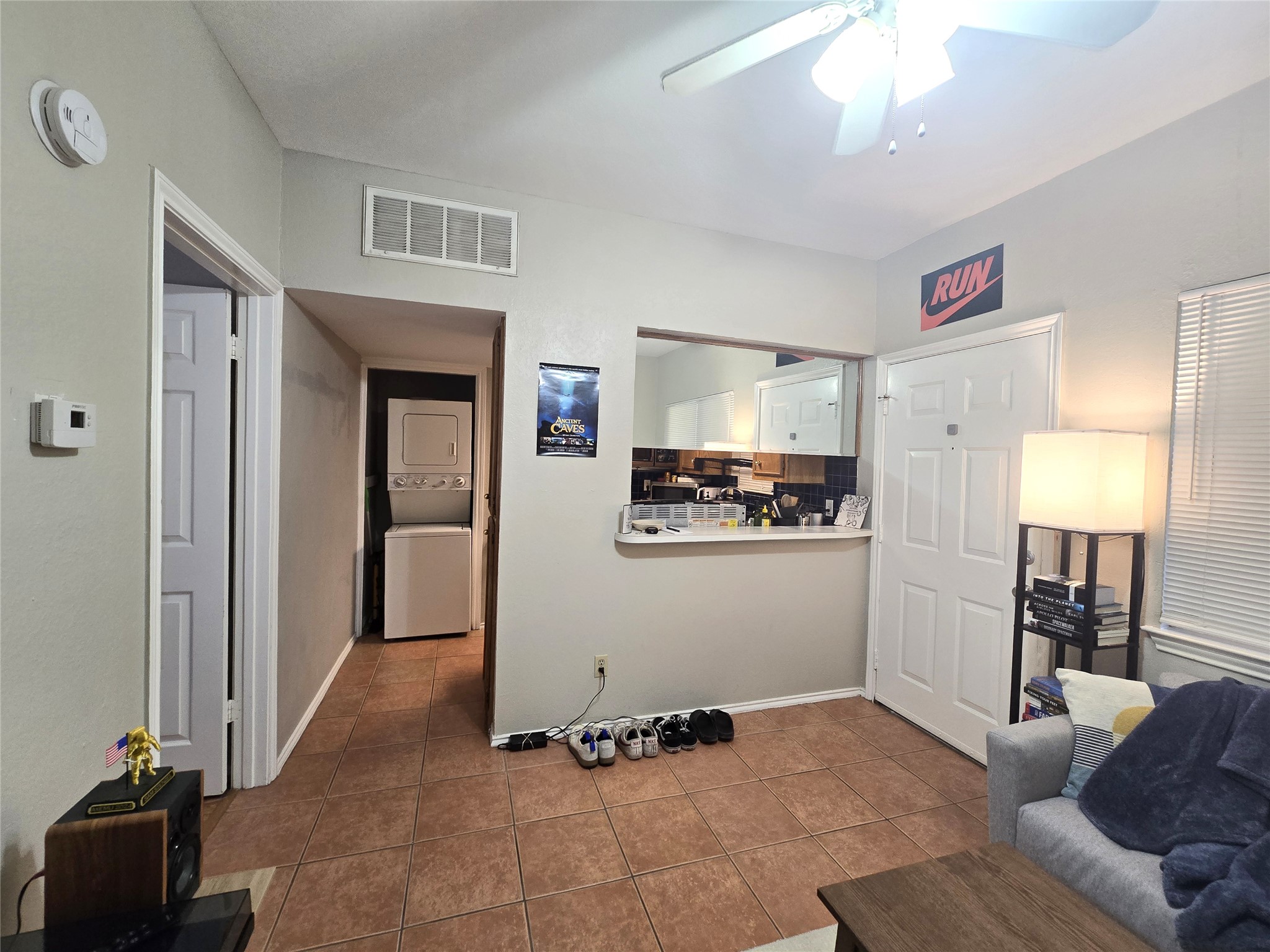 706 West 22nd Street, Unit 307 Austin, TX 78705 - Photo 3 of 20 a view of kitchen with furniture and refrigerator