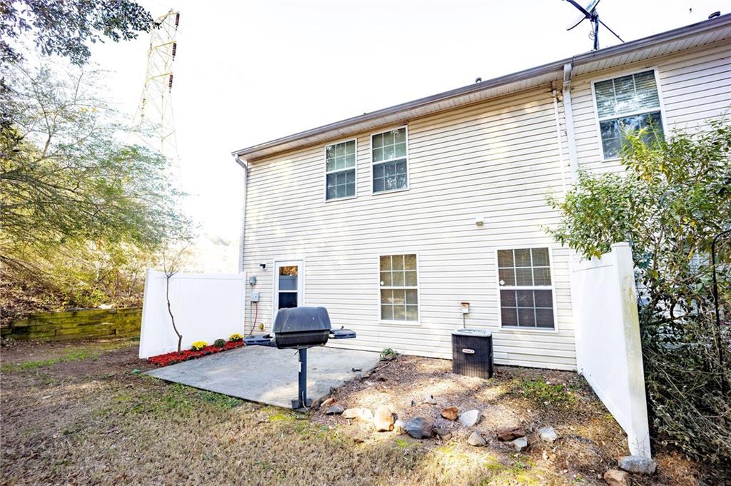 1468 Box Circle Winder, GA 30680 - Photo 15 of 33 a view of a house with a yard and garage