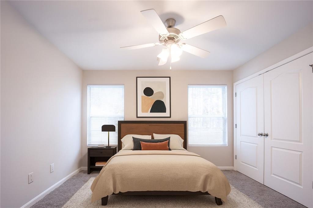 1468 Box Circle Winder, GA 30680 - Photo 19 of 33 a bedroom with a bed and window