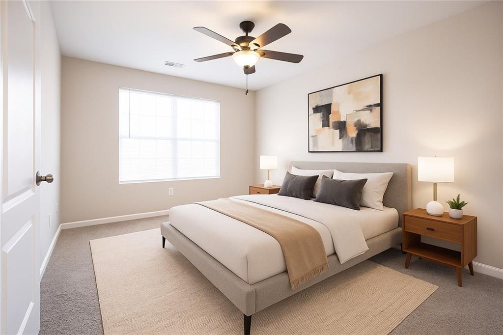 1468 Box Circle Winder, GA 30680 - Photo 23 of 33 a bedroom with bed and a chandelier