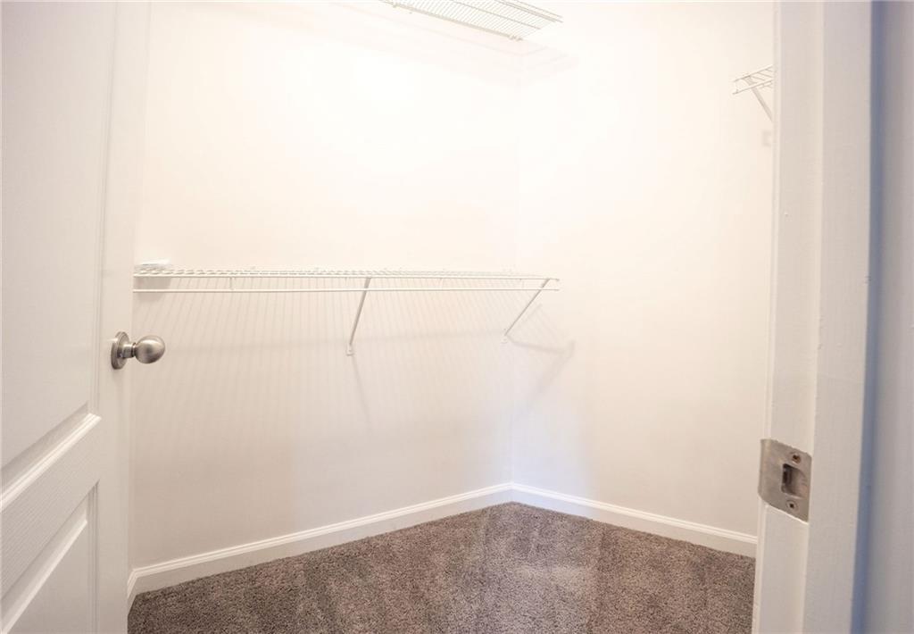 1468 Box Circle Winder, GA 30680 - Photo 26 of 33 a view of a room with racks on the wall