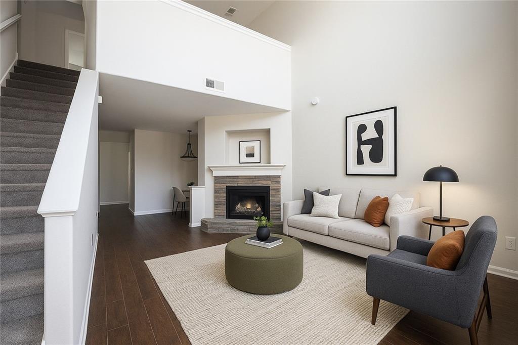 1468 Box Circle Winder, GA 30680 - Photo 4 of 33 a living room with furniture and a fireplace