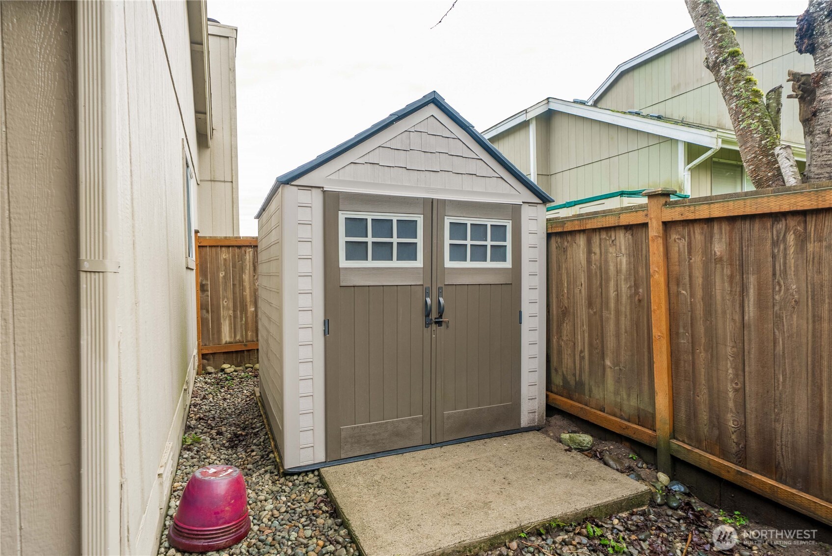 24501 234th Way Southeast Maple Valley, WA 98038 - Photo 8 of 34 a view of entryway with wooden floor