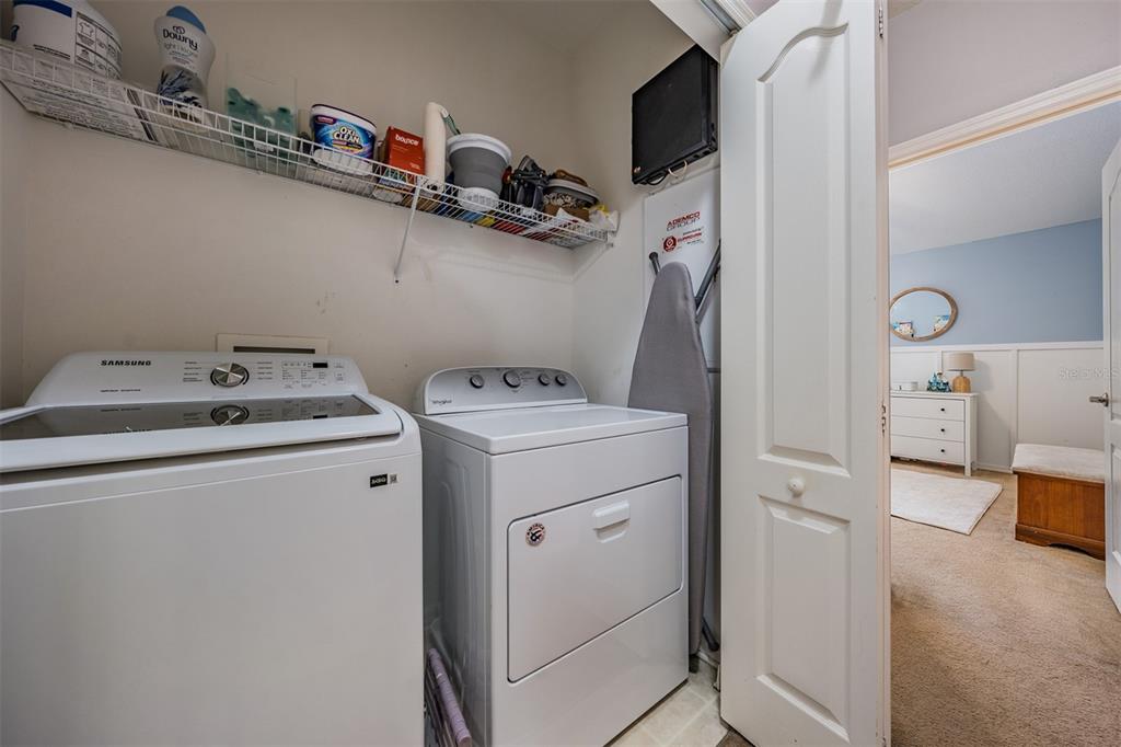 5886 Fishhawk Ridge Drive Lithia, FL 33547 - Photo 21 of 37 a utility room with dryer and washer