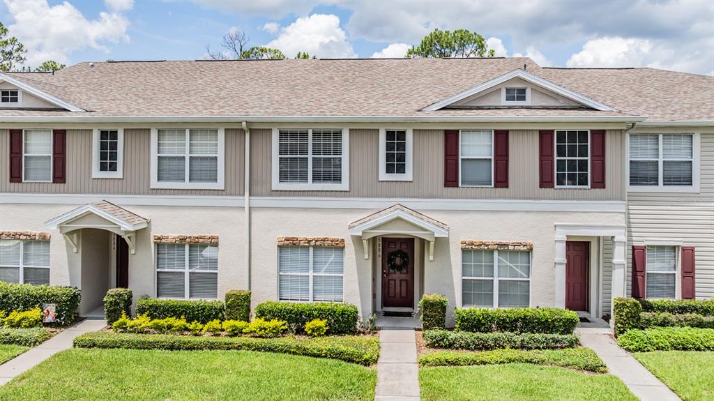 5886 Fishhawk Ridge Drive Lithia, FL 33547 - Photo 29 of 37 a front view of a house with garden