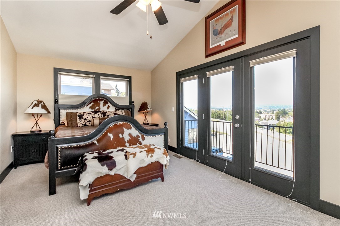 1203 South 3rd Street Renton, WA 98057 - Photo 15 of 40 a bedroom with furniture and a window