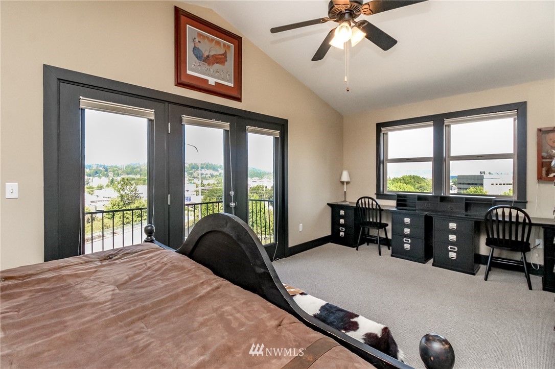 1203 South 3rd Street Renton, WA 98057 - Photo 16 of 40 a bedroom with furniture and windows