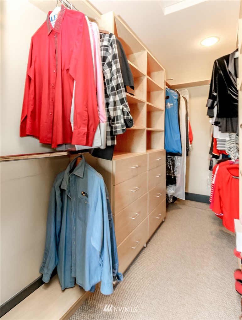 1203 South 3rd Street Renton, WA 98057 - Photo 21 of 40 a view of walk in closet with clothes and shoes