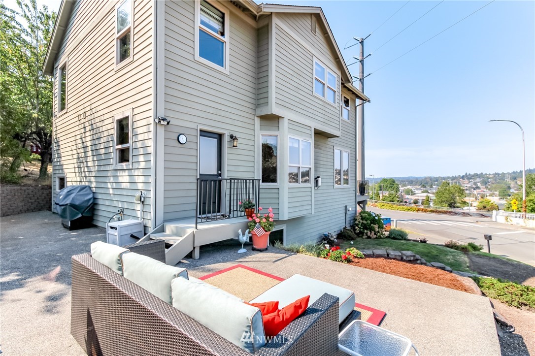 1203 South 3rd Street Renton, WA 98057 - Photo 32 of 40 a view of a patio with couches and a table and chairs