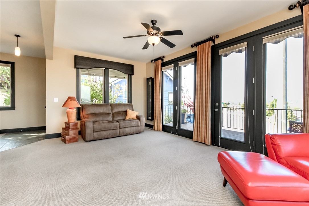 1203 South 3rd Street Renton, WA 98057 - Photo 6 of 40 a living room with furniture and a large window