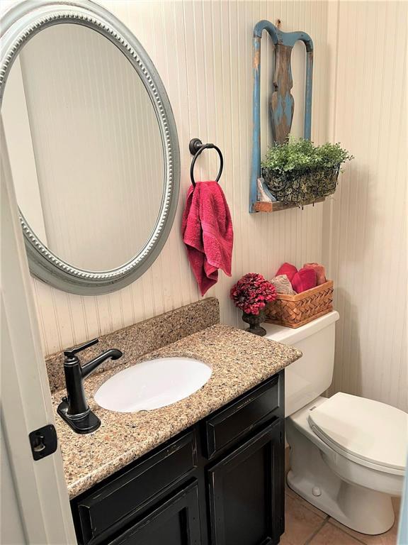 2815 Farm To Market Road 3092 Gainesville, TX 76240 - Photo 11 of 28 a bathroom with a granite countertop sink and a mirror