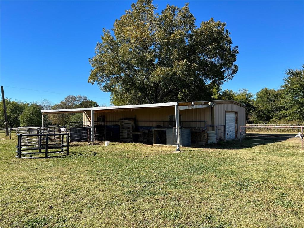 2815 Farm To Market Road 3092 Gainesville, TX 76240 - Photo 16 of 28 a view of a house with a yard