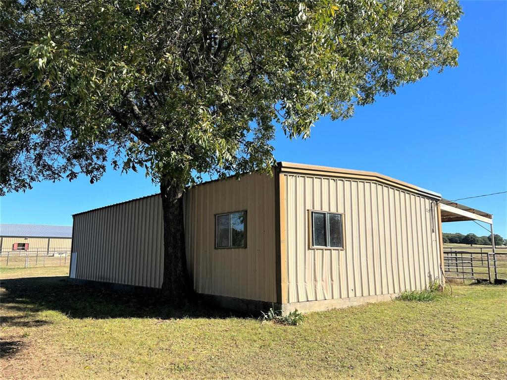 2815 Farm To Market Road 3092 Gainesville, TX 76240 - Photo 17 of 28 a view of a house with a yard