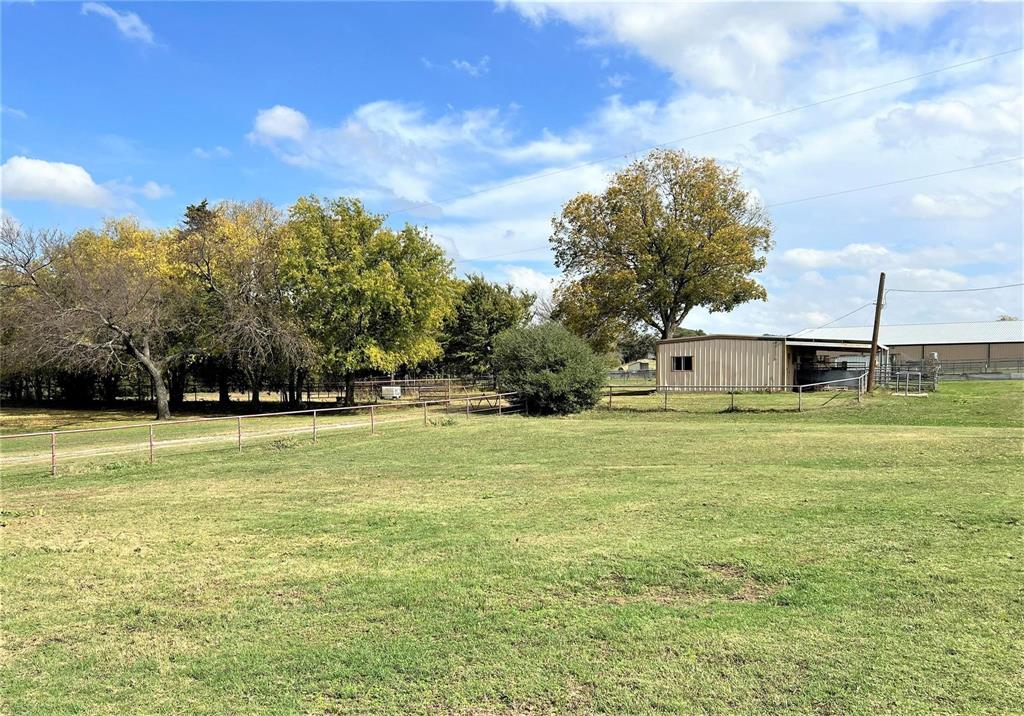 2815 Farm To Market Road 3092 Gainesville, TX 76240 - Photo 20 of 28 a view of a house with a big yard