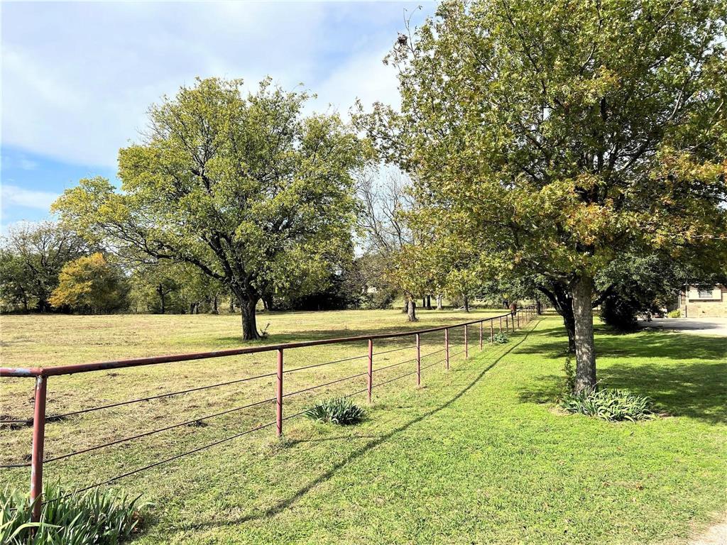 2815 Farm To Market Road 3092 Gainesville, TX 76240 - Photo 2 of 28 a view of an outdoor space and tennis court