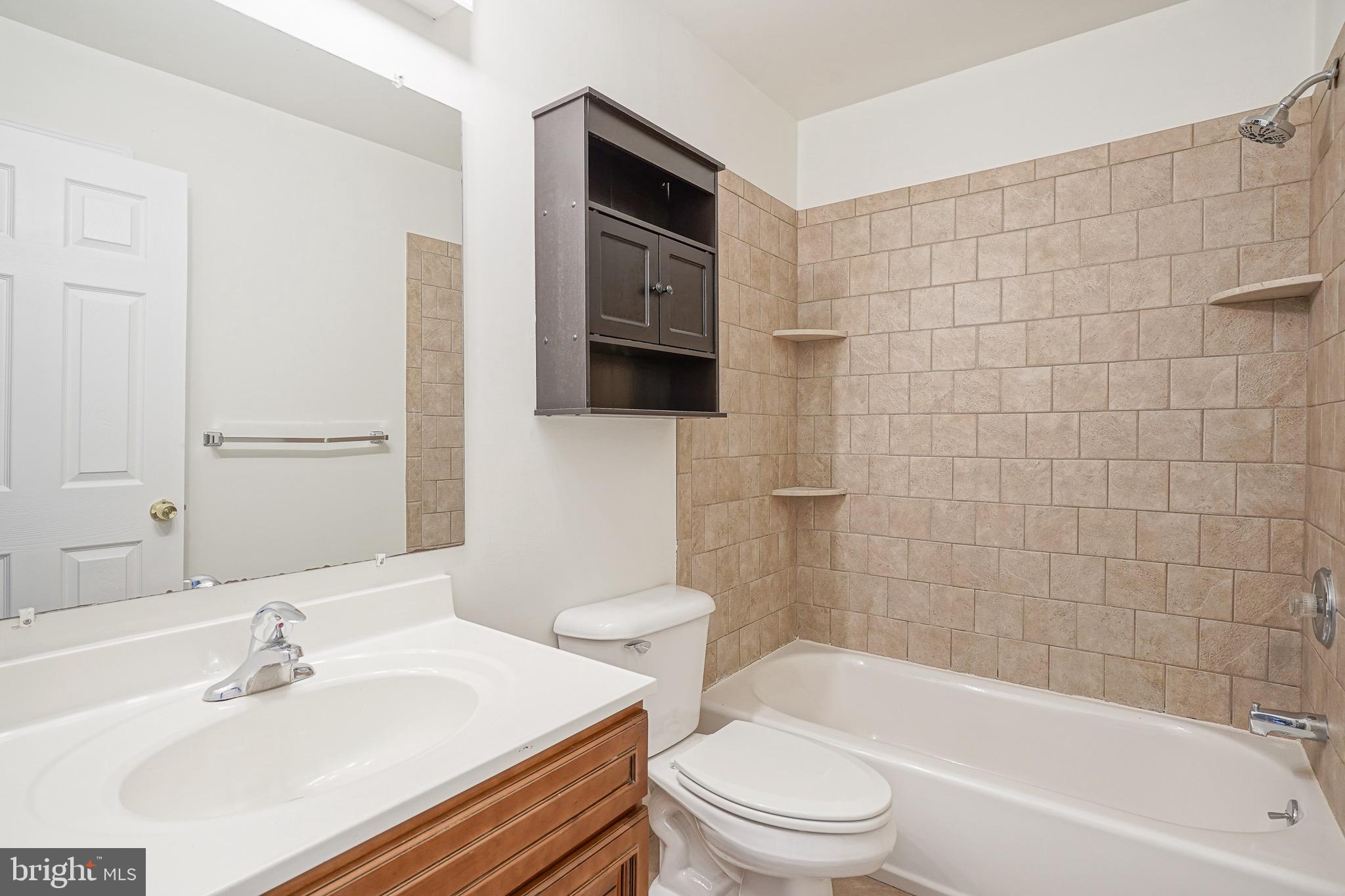 117 Chaucer Road Mount Laurel, NJ 08054 - Photo 12 of 20 a bathroom with a sink a toilet and shower