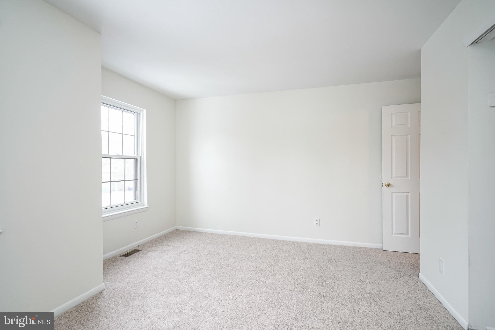117 Chaucer Road Mount Laurel, NJ 08054 - Photo 14 of 20 an empty room with windows