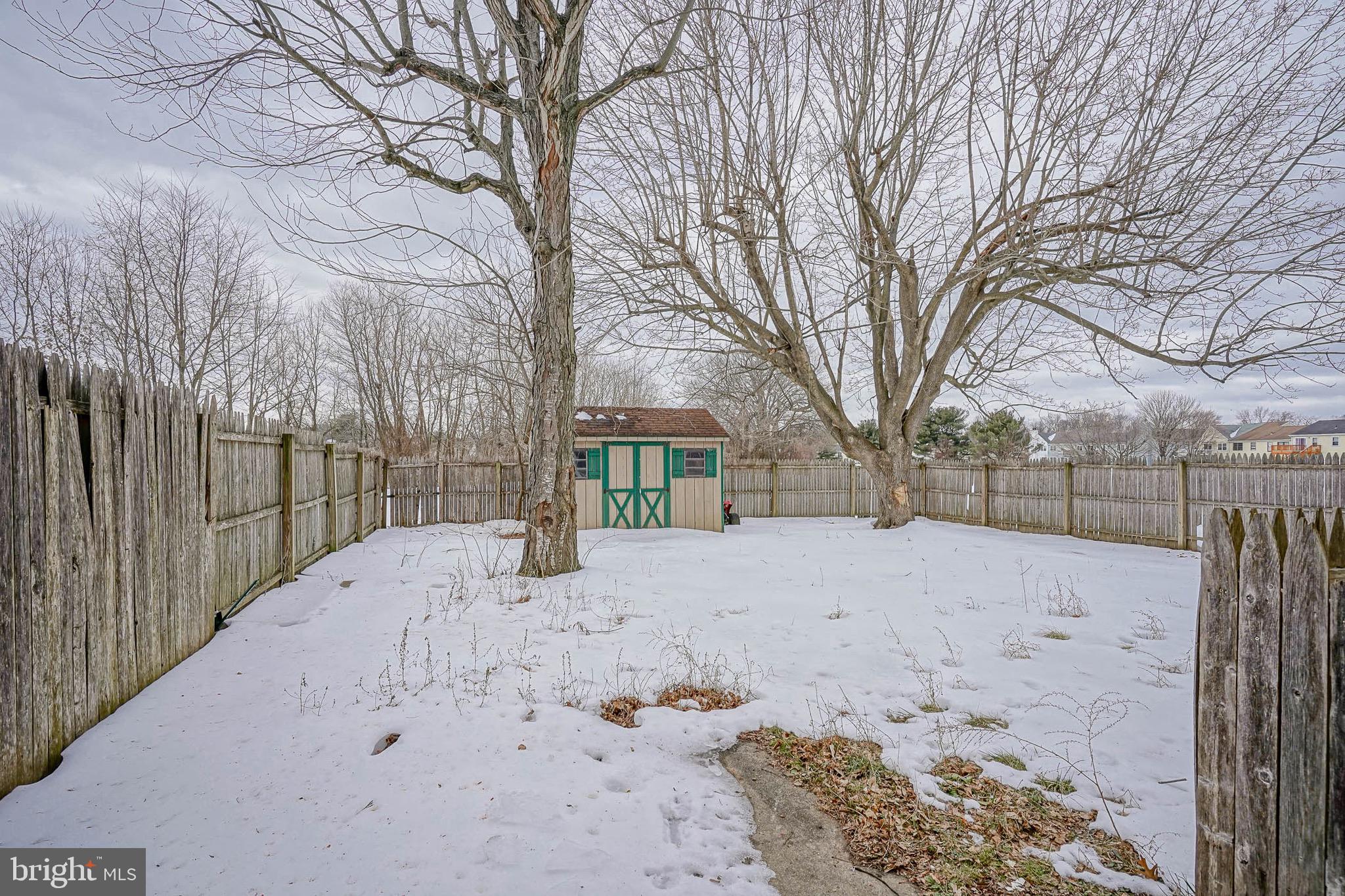 117 Chaucer Road Mount Laurel, NJ 08054 - Photo 20 of 20 a view of snow on the side of the road
