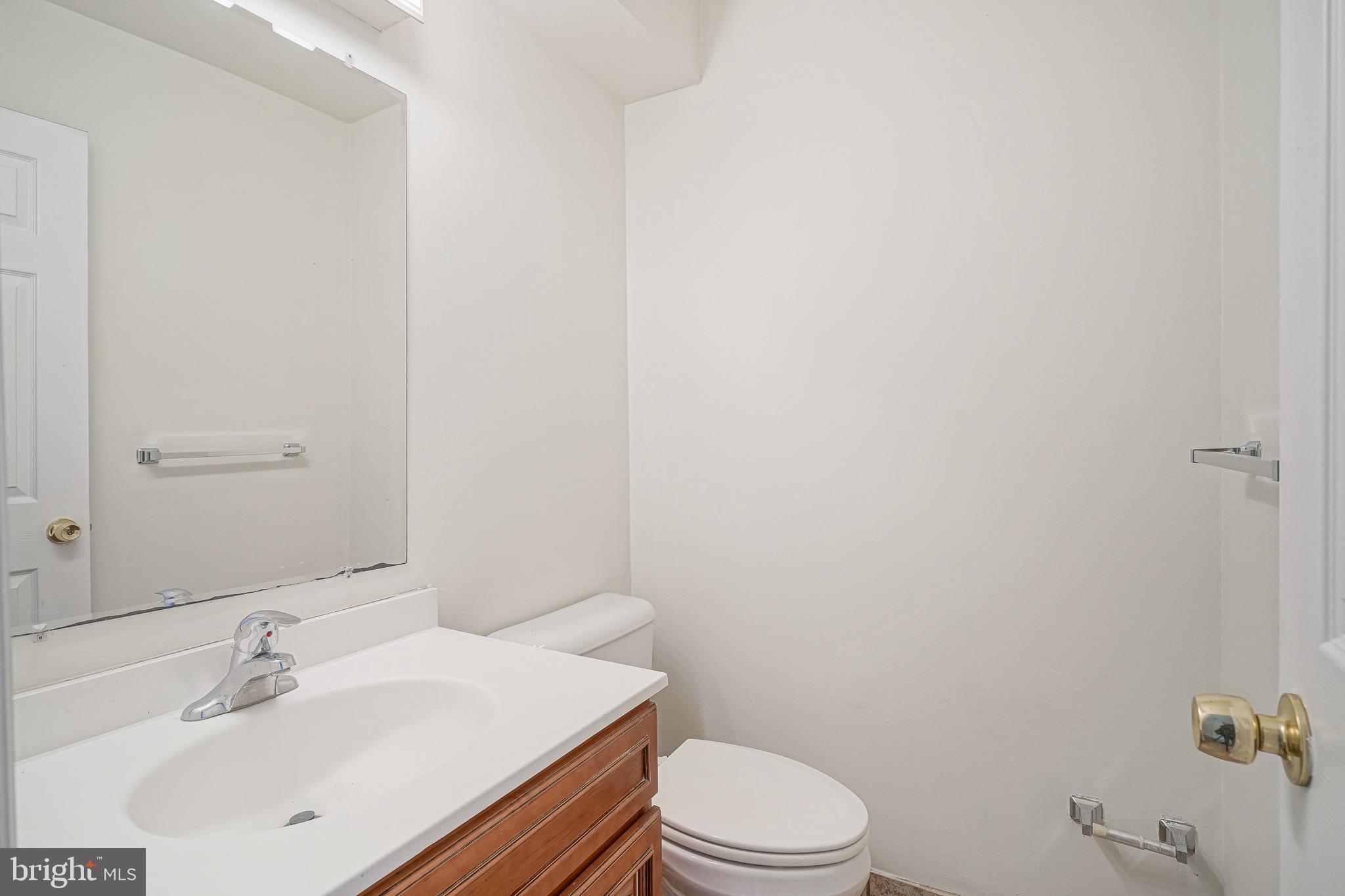 117 Chaucer Road Mount Laurel, NJ 08054 - Photo 5 of 20 a bathroom with a sink a toilet and mirror