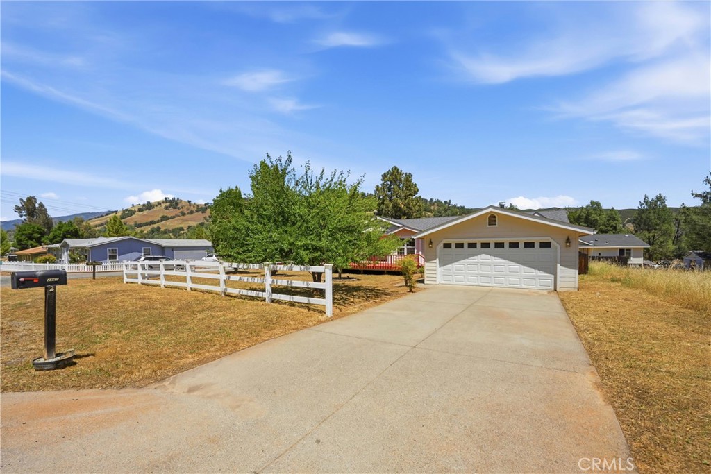 2860 Spring Valley Road Clearlake Oaks, CA 95423 - Photo 1 of 38 a view of a swimming pool with an ocean view