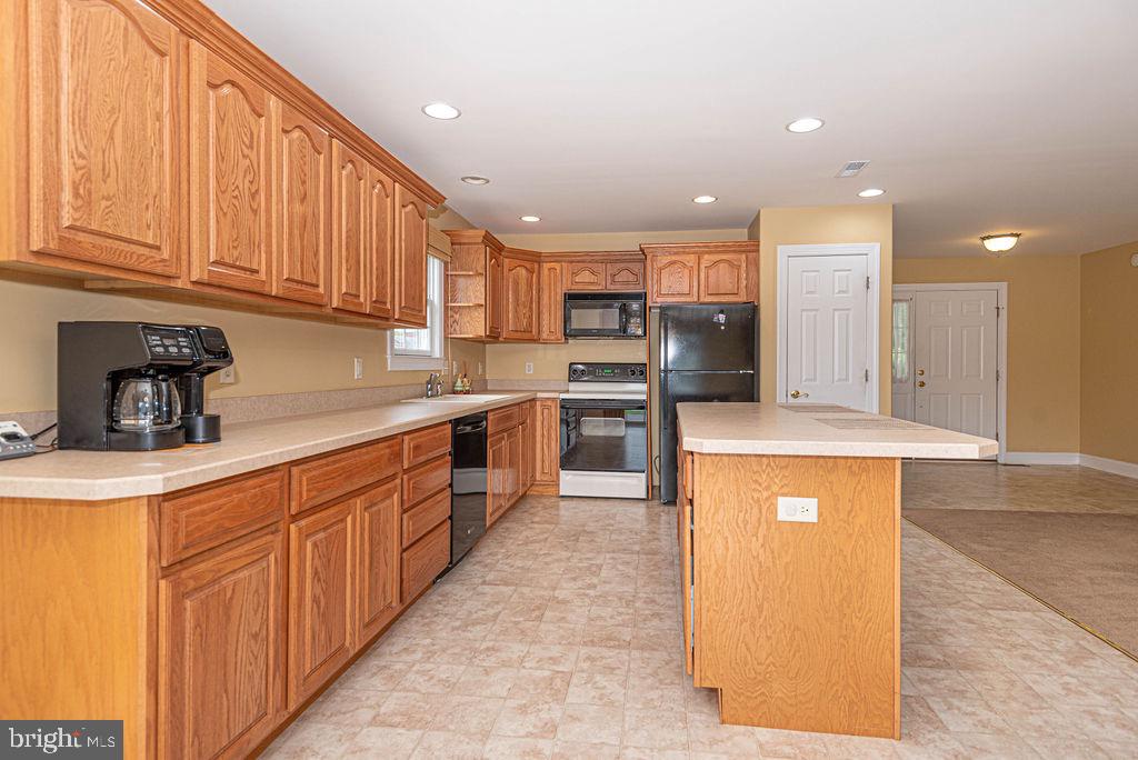 221 Old Laurel Road Georgetown, DE 19947 - Photo 5 of 36 Have a seat at the breakfast bar