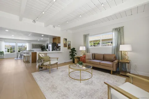 a living room with furniture and a table