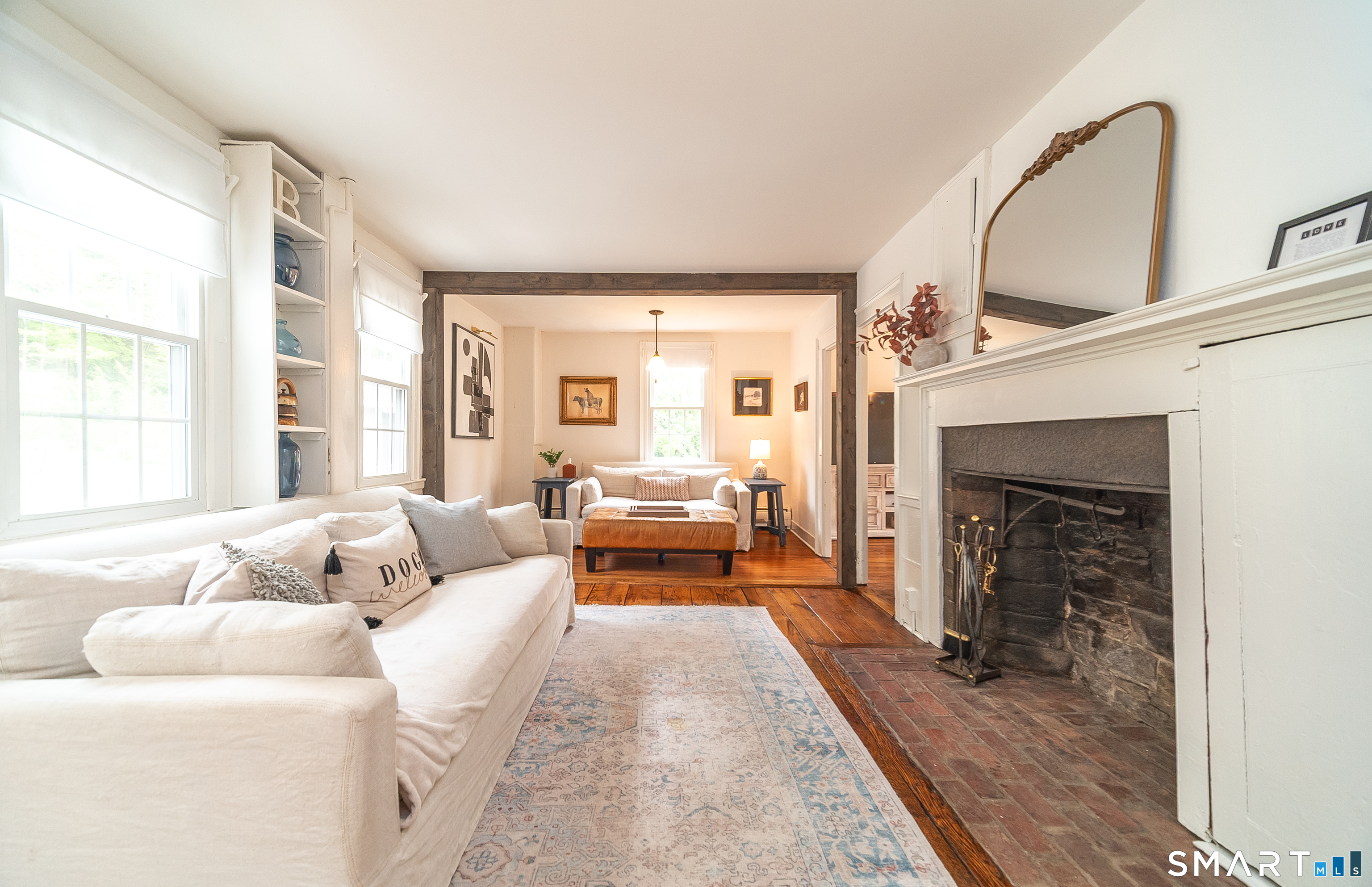 230 Killingworth Road Haddam, CT 06441 - Photo 11 of 36 a living room with furniture and a fireplace