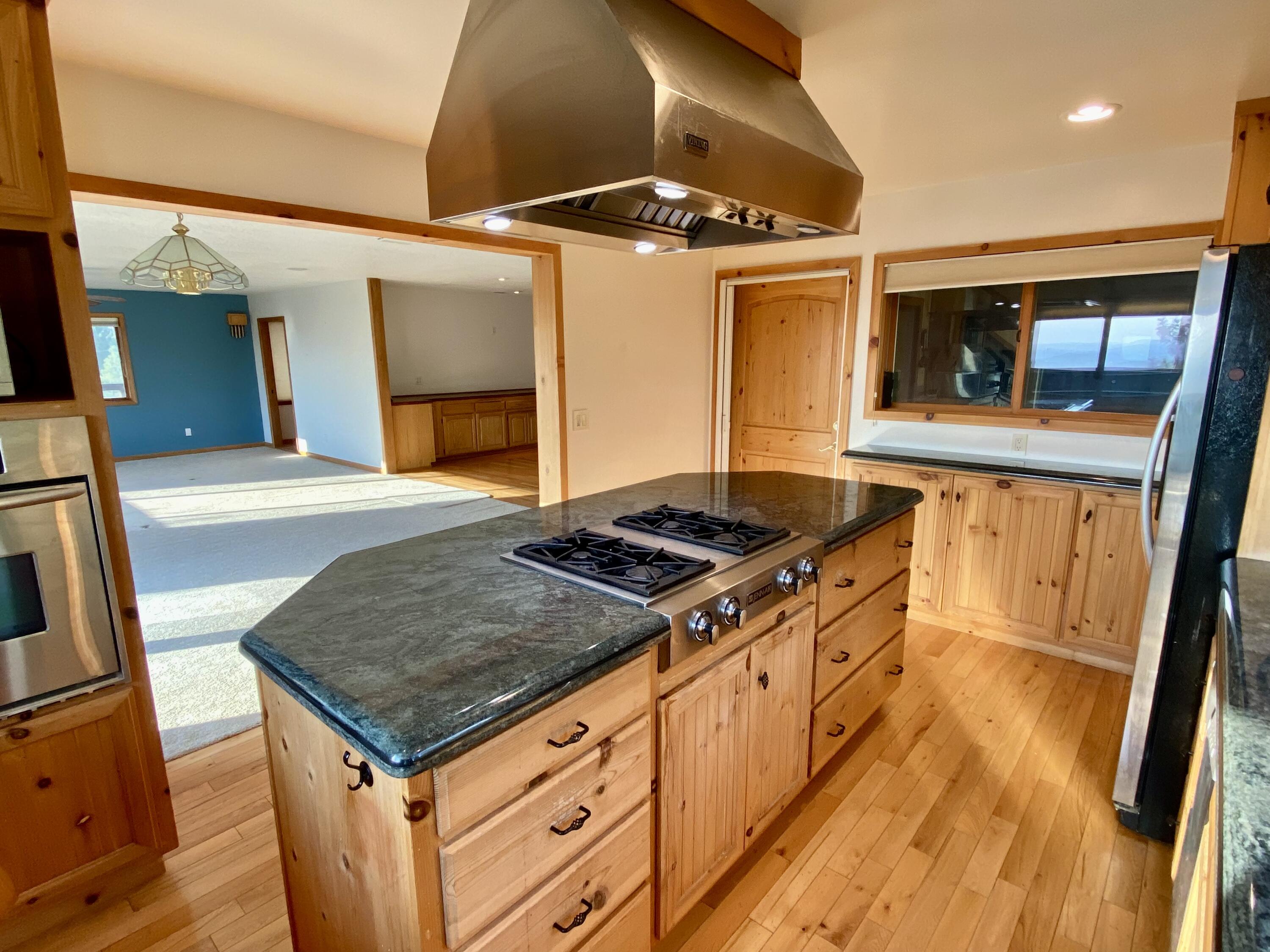 30503 Terry Mill Road Montgomery Creek, CA 96065 - Photo 16 of 75 a kitchen with sink stove and cabinets