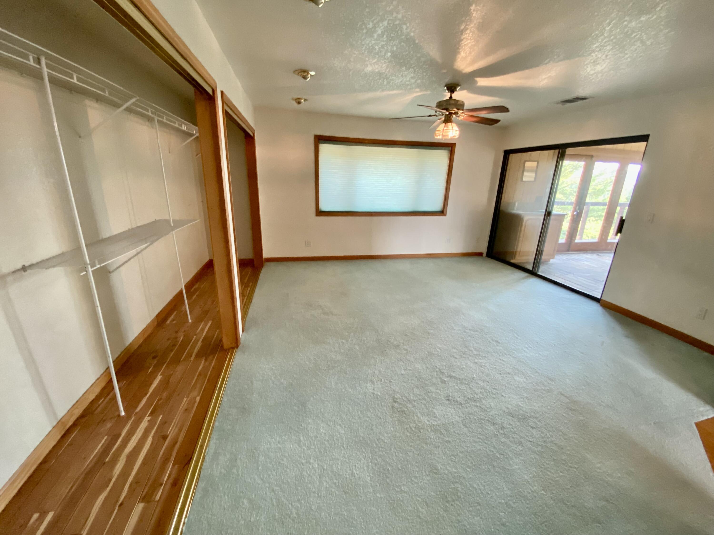 30503 Terry Mill Road Montgomery Creek, CA 96065 - Photo 33 of 75 a view of an empty room with a window and a dresser