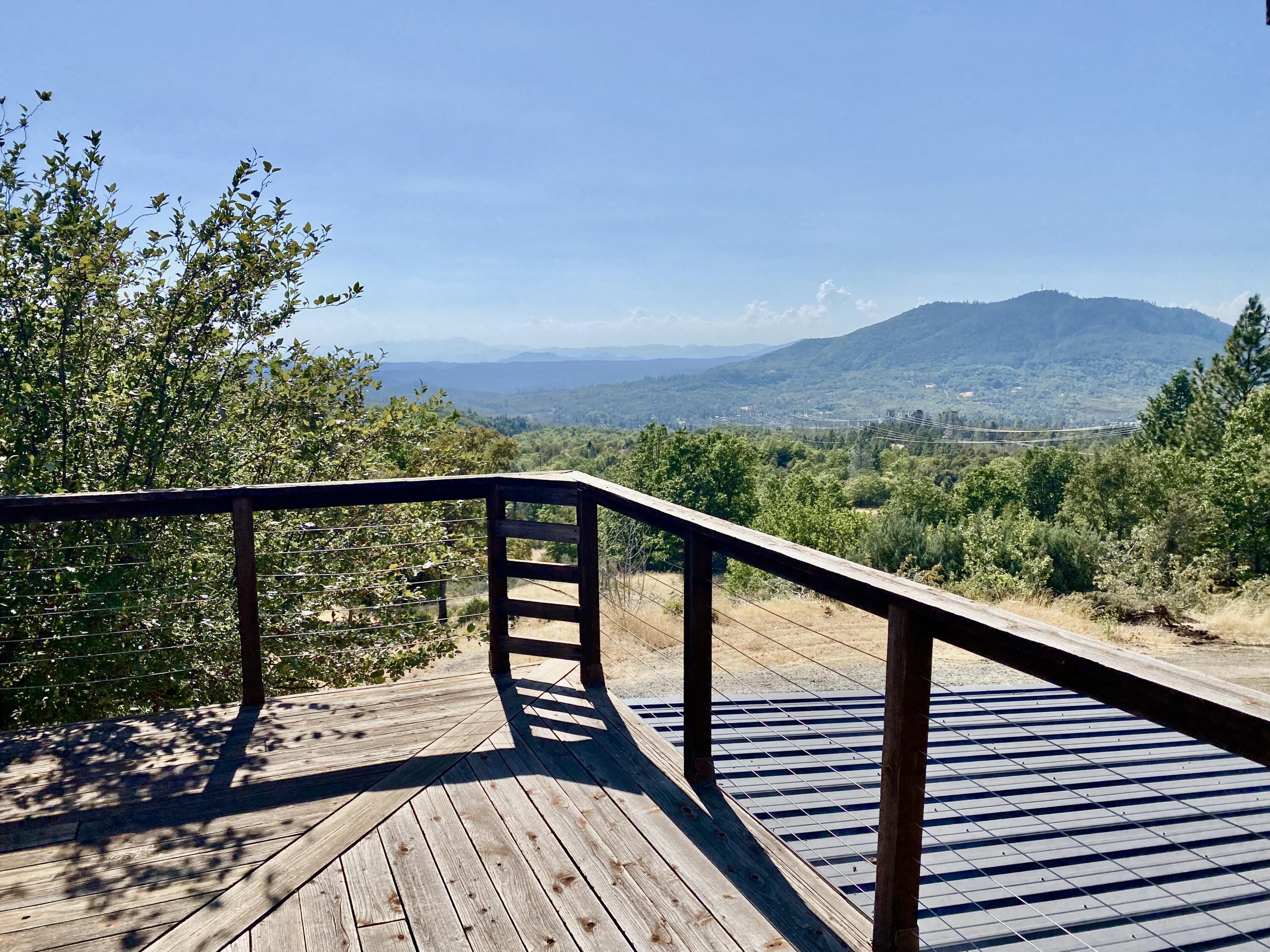 30503 Terry Mill Road Montgomery Creek, CA 96065 - Photo 39 of 75 a view of a balcony with a swing