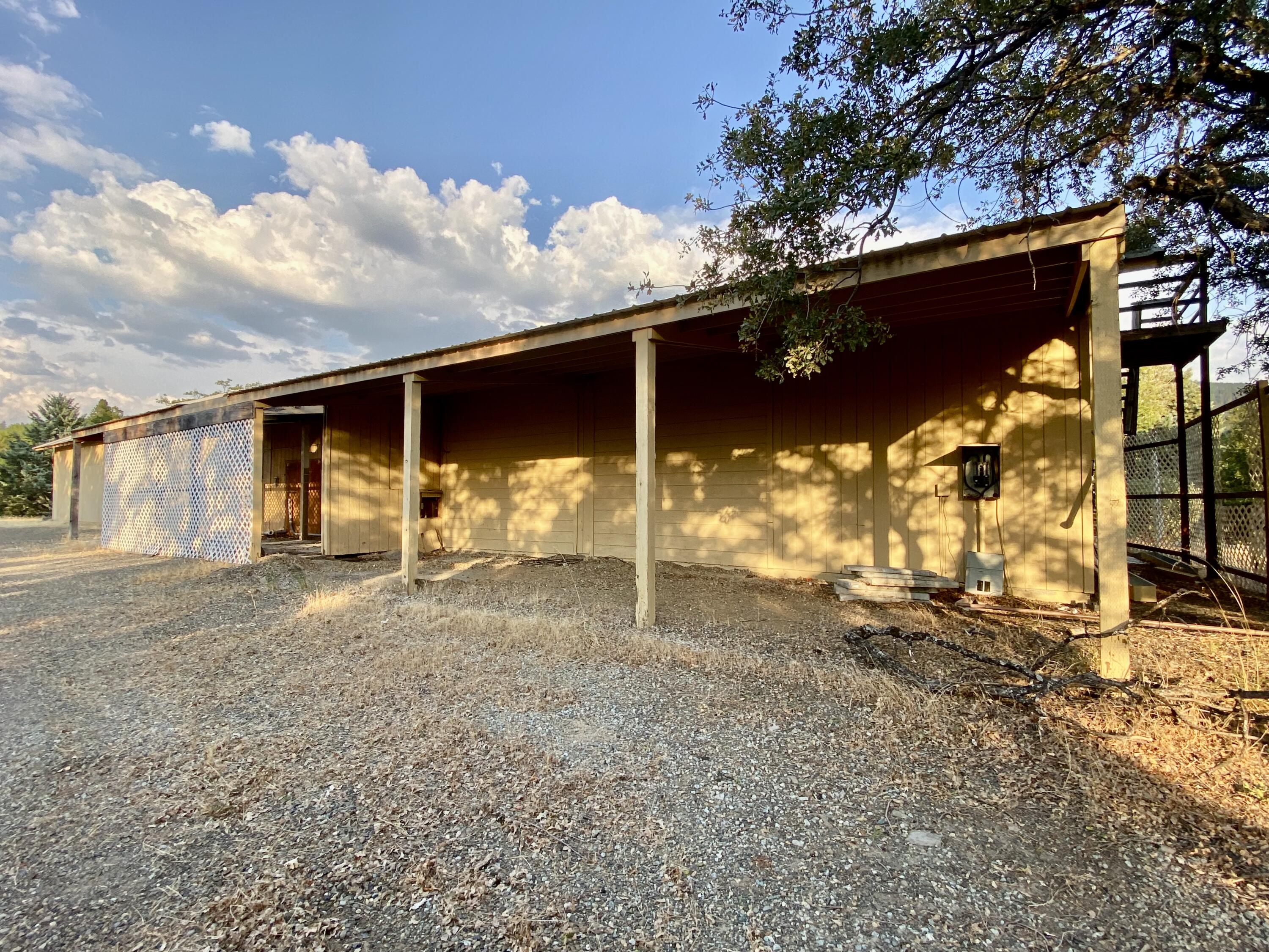 30503 Terry Mill Road Montgomery Creek, CA 96065 - Photo 42 of 75 a view of a house with a backyard