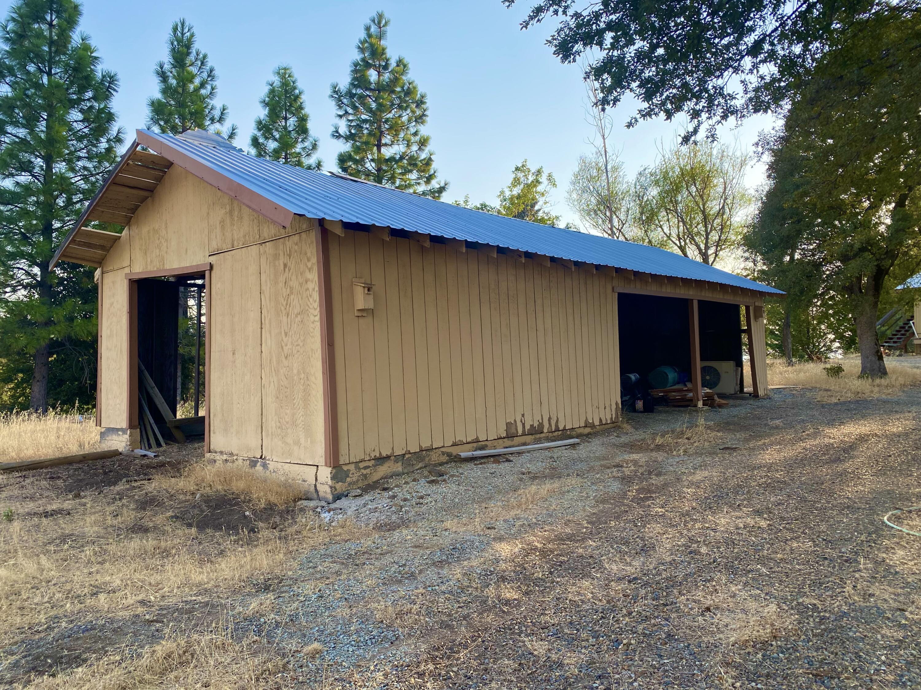 30503 Terry Mill Road Montgomery Creek, CA 96065 - Photo 50 of 75 a view of a house with a yard