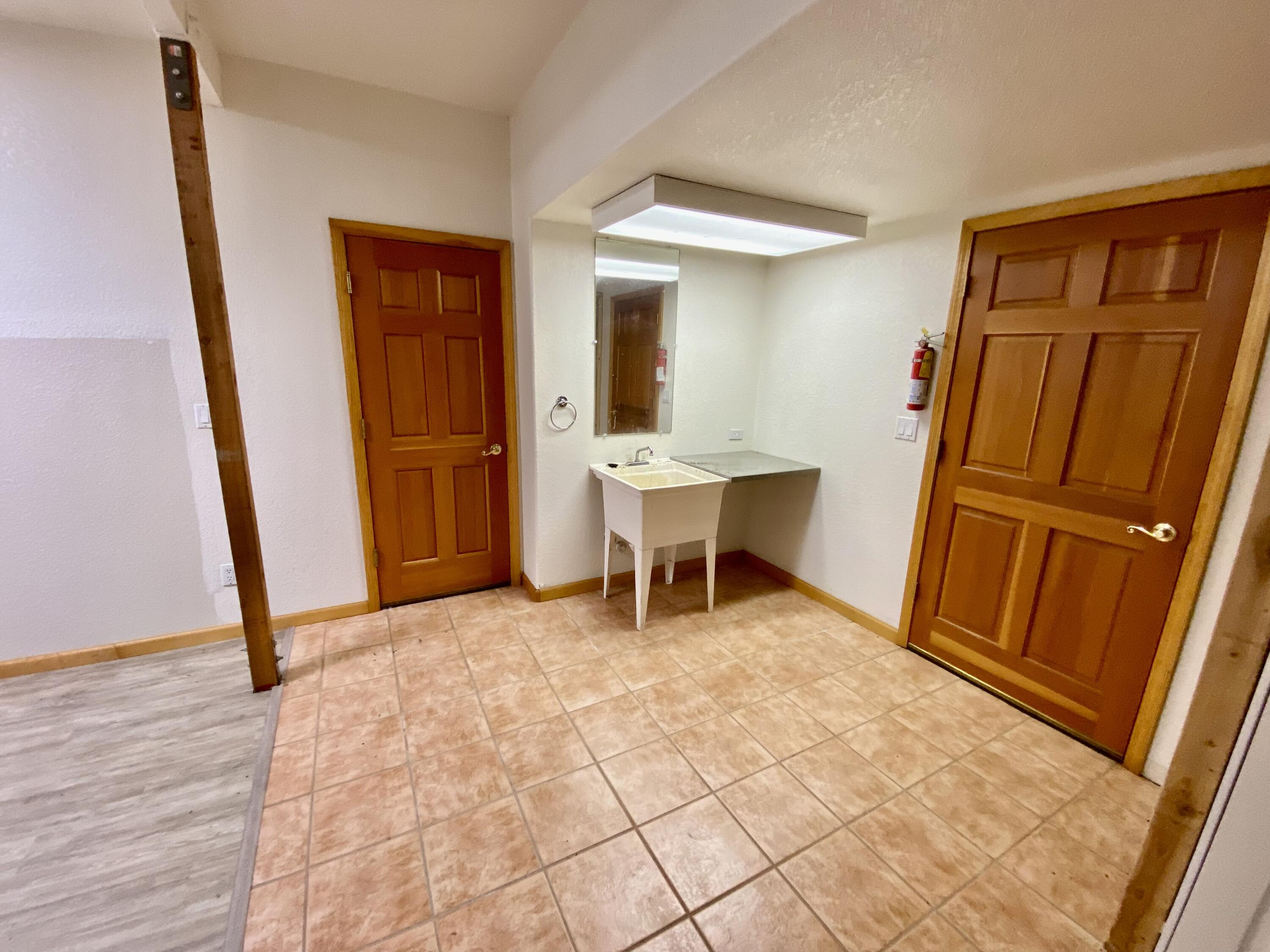 30503 Terry Mill Road Montgomery Creek, CA 96065 - Photo 55 of 75 a view of a hallway with furniture and wooden floor