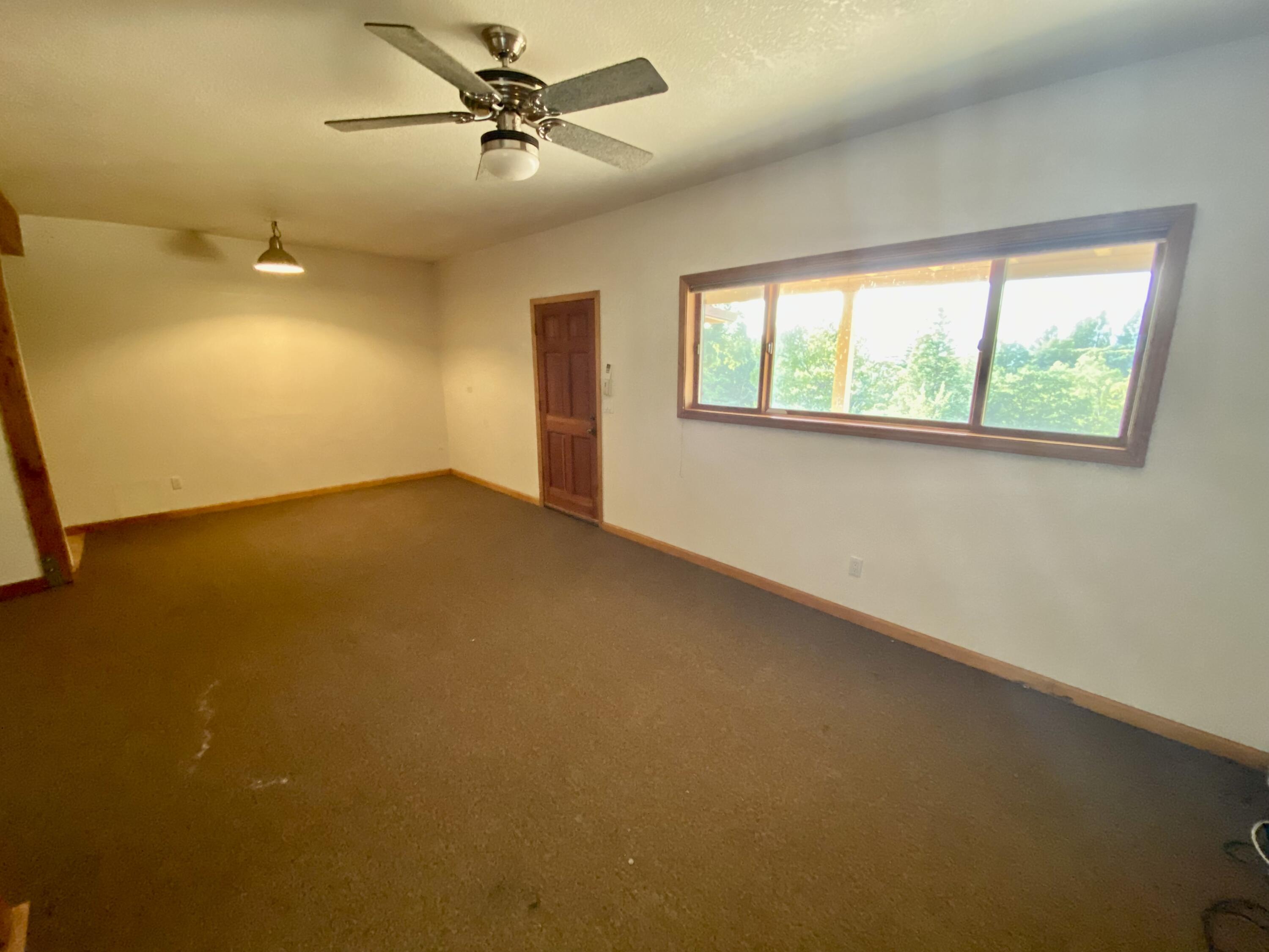 30503 Terry Mill Road Montgomery Creek, CA 96065 - Photo 57 of 75 an empty room with a window