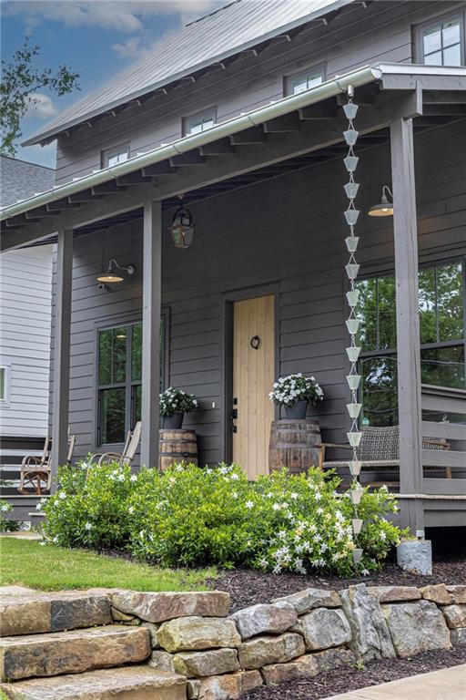 1412 Carroll Drive Northwest Atlanta, GA 30318 - Photo 2 of 42 a front view of a house with a yard