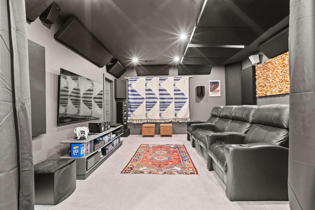 1412 Carroll Drive Northwest Atlanta, GA 30318 - Photo 32 of 42 a living room with furniture a flat screen tv and a large window