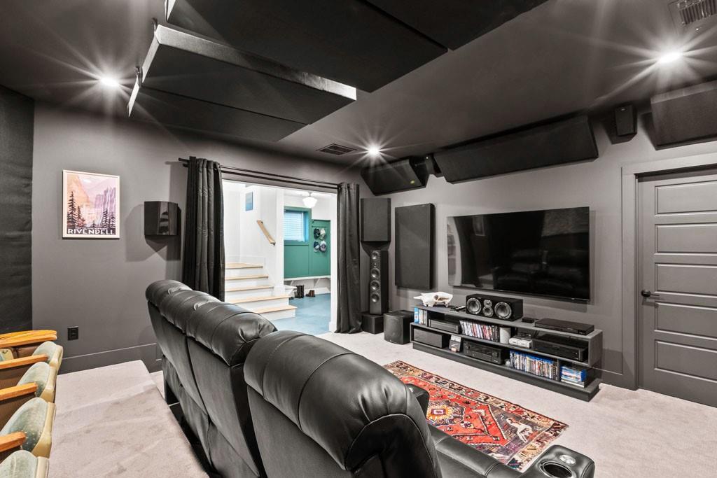 1412 Carroll Drive Northwest Atlanta, GA 30318 - Photo 33 of 42 a living room with furniture and a flat screen tv