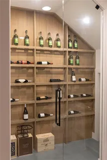 a view of a house with a patio and a yard