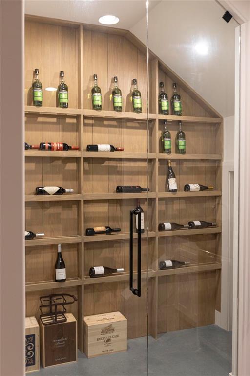 1412 Carroll Drive Northwest Atlanta, GA 30318 - Photo 35 of 42 a kitchen with a wooden floor and cabinets
